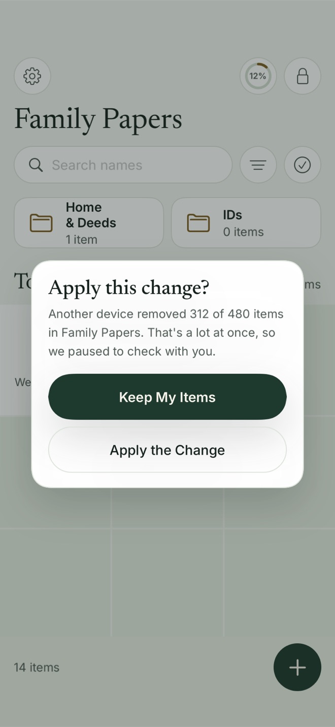 A Bunker alert titled Apply this change, saying another device removed 312 of 480 items in Family Papers, with buttons Keep My Items and Apply the Change.